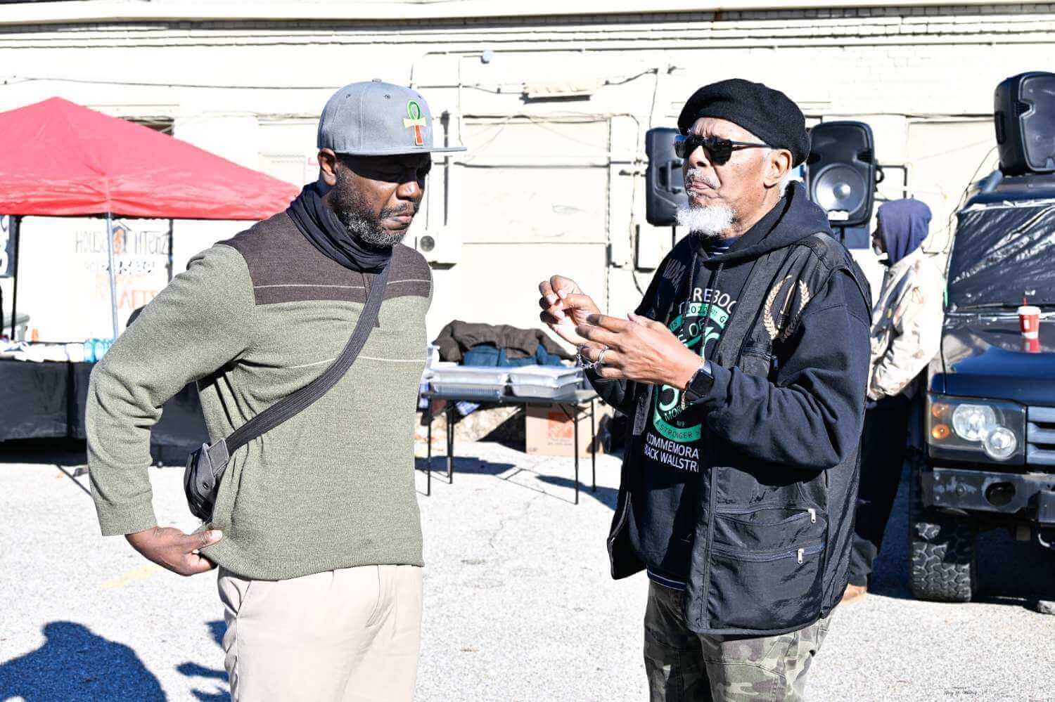 Gilbert Barnes Carter III speaks with Mr. Joe Calhoun.